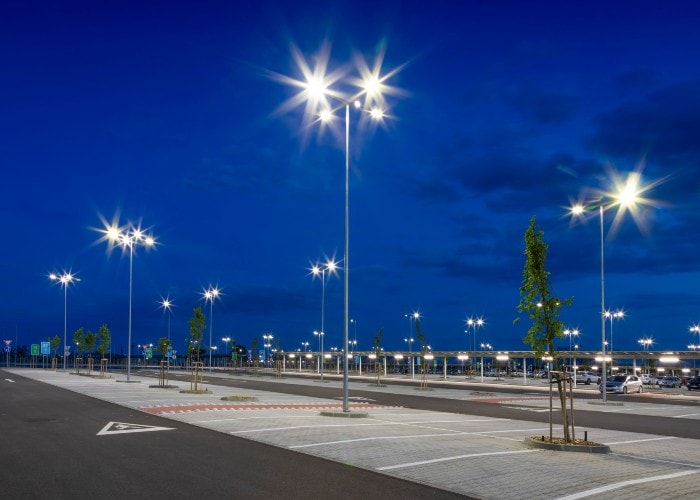 A well-lit empty parking lot