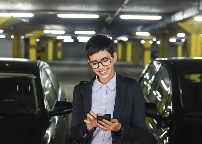 Woman with cloudcharge mobile app