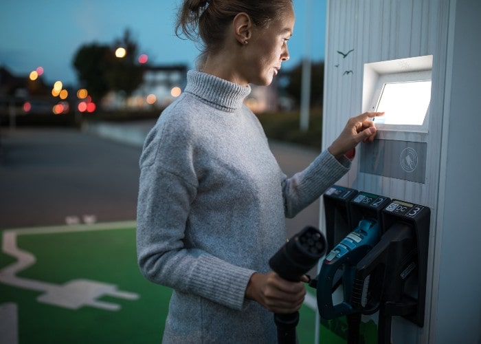 Woman using fast charger