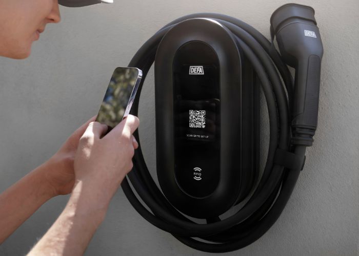 electrician configuring defa power ev charger