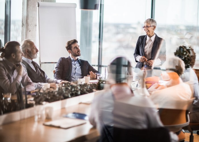 Woman presenting in meeting room