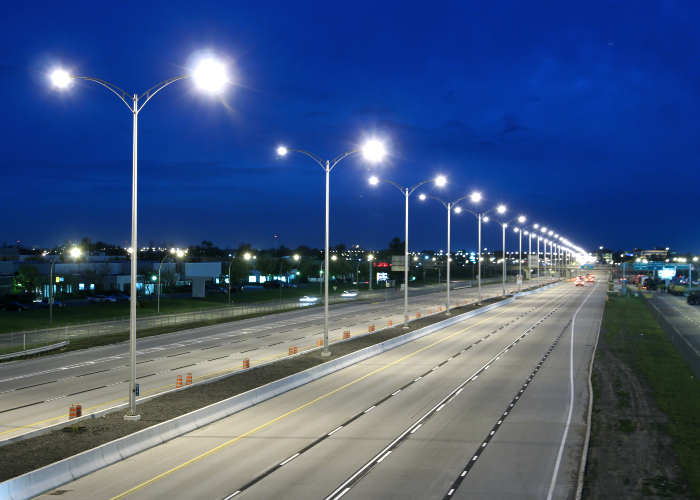 A well lit multi-lane highway