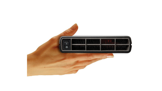 Termini 1200W interior heater, held flat in a hand