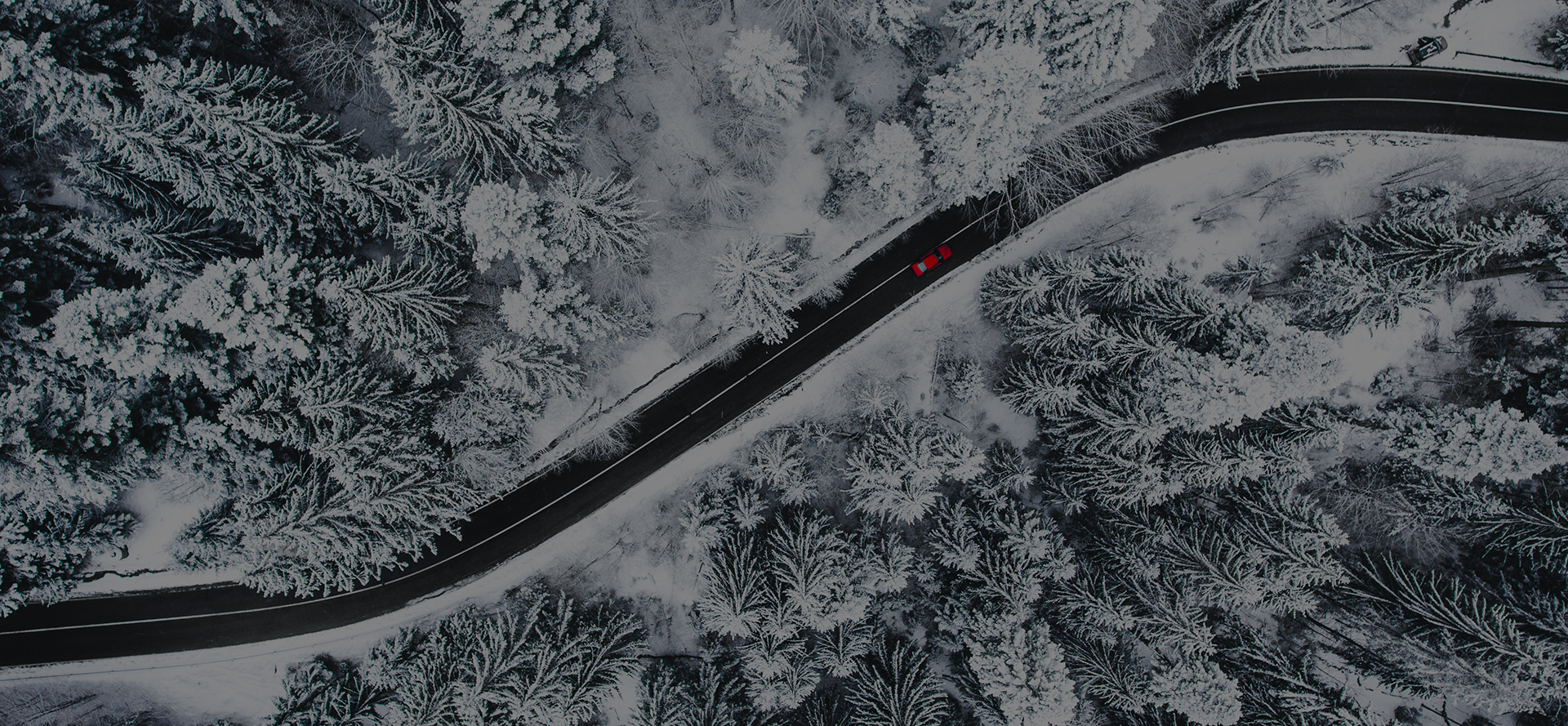 Winter road red car